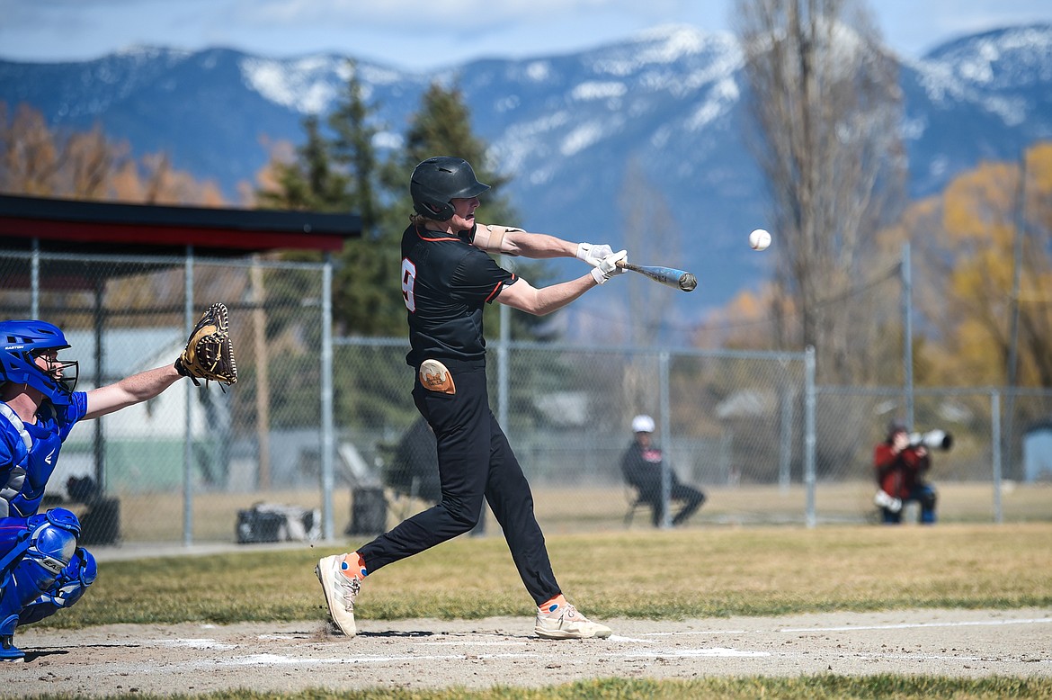 Eureka's Tristan Butts (9) knocks in two runs in the first inning against Bigfork at ABS Park in Evergreen on Tuesday, April 2. (Casey Kreider/Daily Inter Lake)