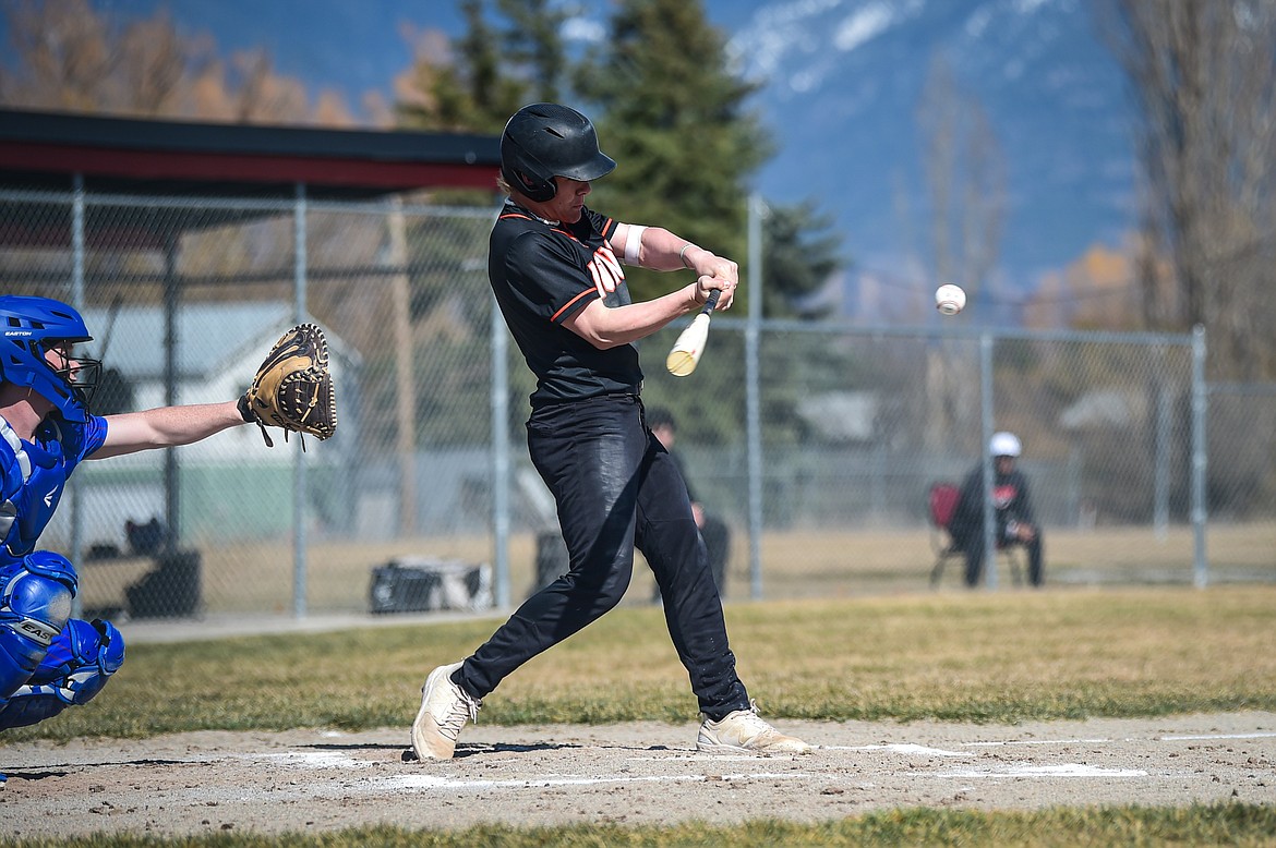 Eureka's Rogan Lytle (3) knocks in two runs in the third inning against Bigfork at ABS Park in Evergreen on Tuesday, April 2. (Casey Kreider/Daily Inter Lake)