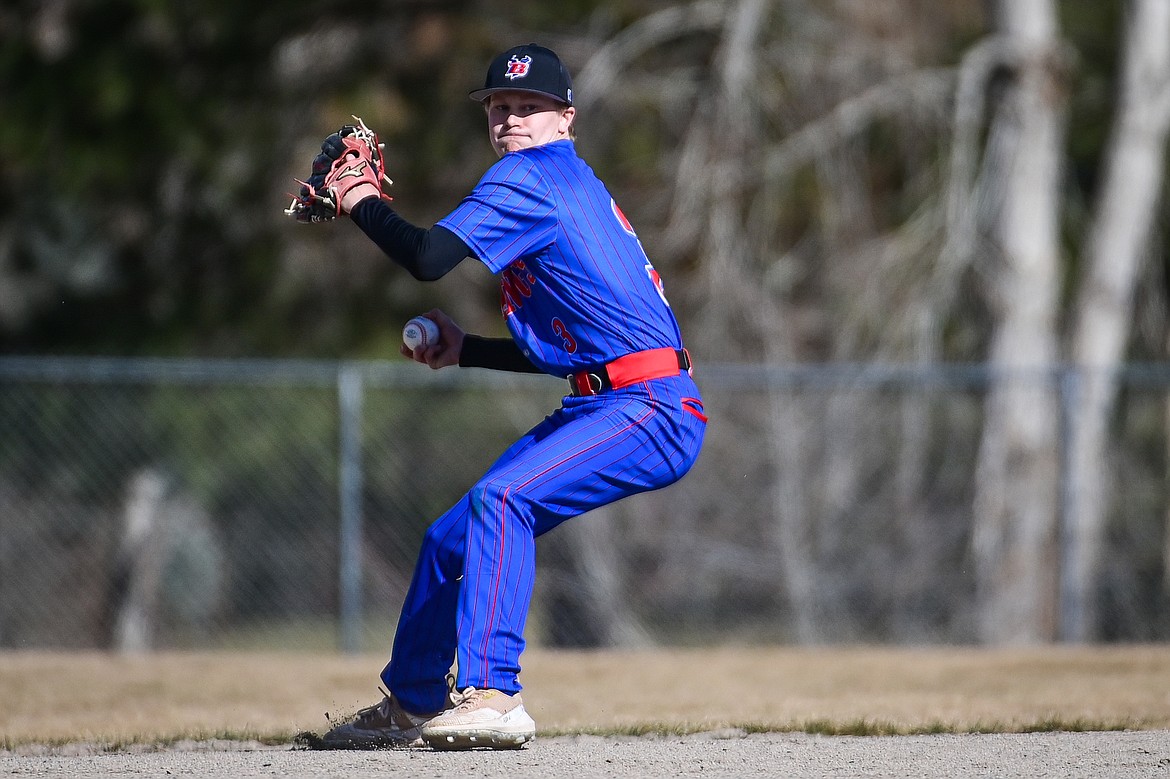 Bigfork shortstop Grady Campbell (3) backhands a grounder and throws across the diamond to first for the out in the fifth inning against Eureka at ABS Park in Evergreen on Tuesday, April 2. (Casey Kreider/Daily Inter Lake)