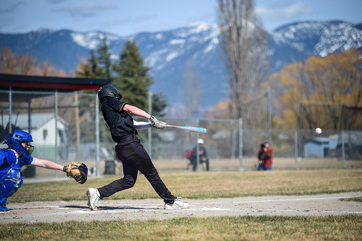 Eureka's Tristan Libby (1) knocks in two runs in the second inning against Bigfork at ABS Park in Evergreen on Tuesday, April 2. (Casey Kreider/Daily Inter Lake)