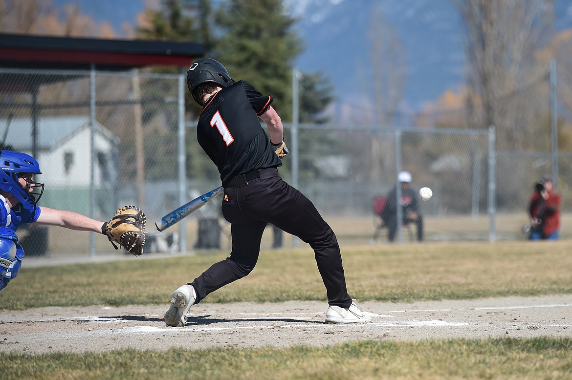 Eureka's Tristan Libby (1) knocks in two runs in the second inning against Bigfork at ABS Park in Evergreen on Tuesday, April 2. (Casey Kreider/Daily Inter Lake)