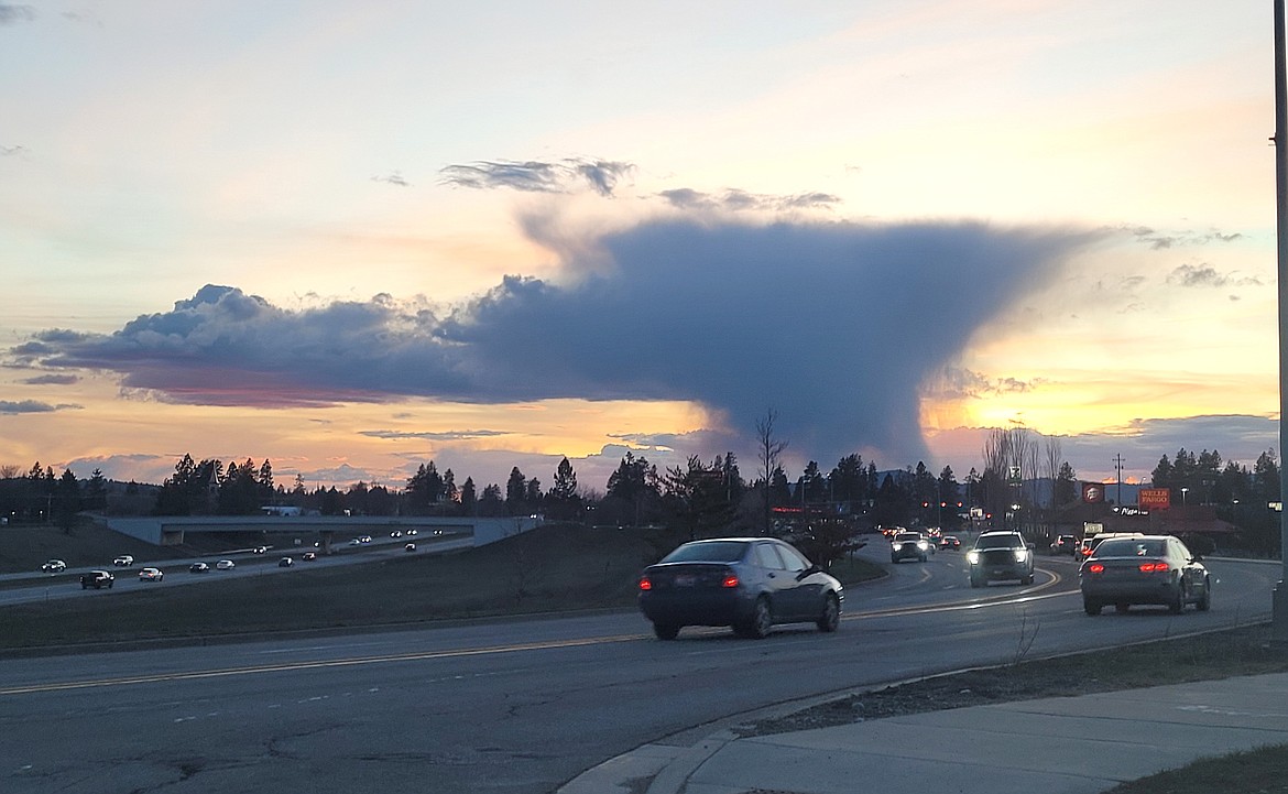 This massive "anvil" cloud was seen during Friday's sunset over western Post Falls. According to the National Oceanic and Atmospheric Administration, the flat, spreading top of a cumulonimbus cloud can often be shaped like an anvil. These "anvil" clouds are many times associated with stormy weather.