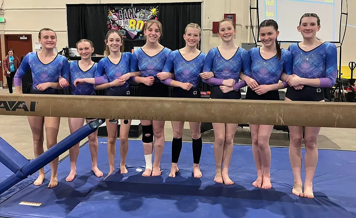 Courtesy photo
GEMS Athletic Center Gold Session 7 at the state Xcel gymnastics championships March 22-24 in Boise. From left are Nora Maddox, Ashley Gwin, Mackenzie Richardson, Delainey Wenstrom, Emily Wright, Fynlie Reynolds, Allie Netzel and Summer Spiker.