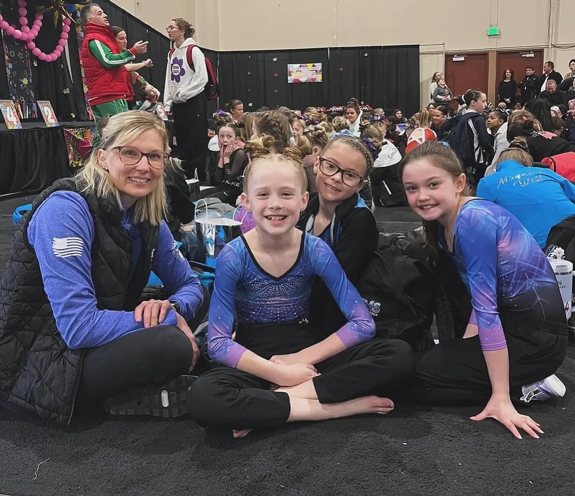 Courtesy photo
GEMS Athletic Center Silver Session 3 at the state Xcel gymnastics championships March 22-24 in Boise. From left are coach Meloney Butcher, Skylar Bingham, Faith Robertson and Emma Ward.