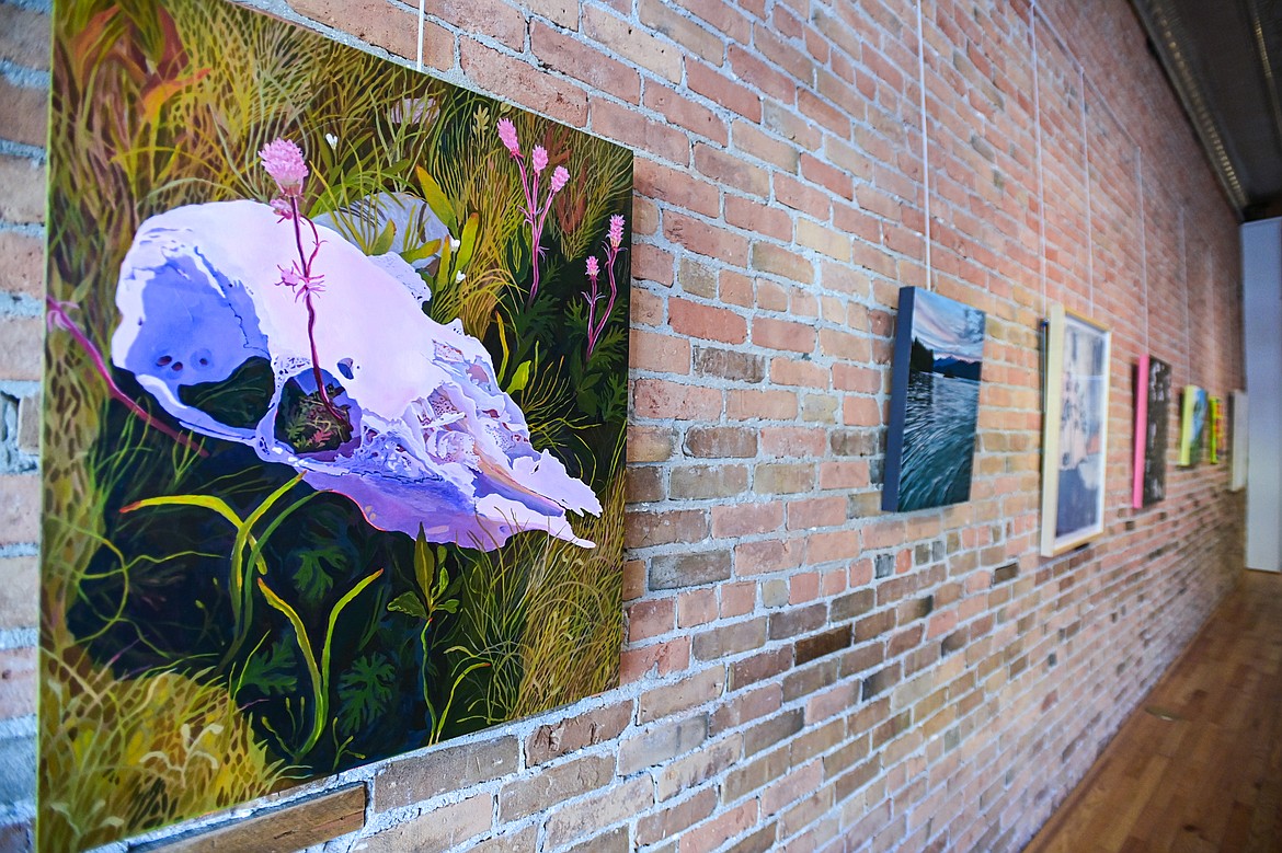 Artist Kris Vardenega's "Weightless Beast" with other featured works in the Bloom one year anniversary exhibition at Good Luck Gallery in Kalispell on Wednesday, April 3. (Casey Kreider/Daily Inter Lake)