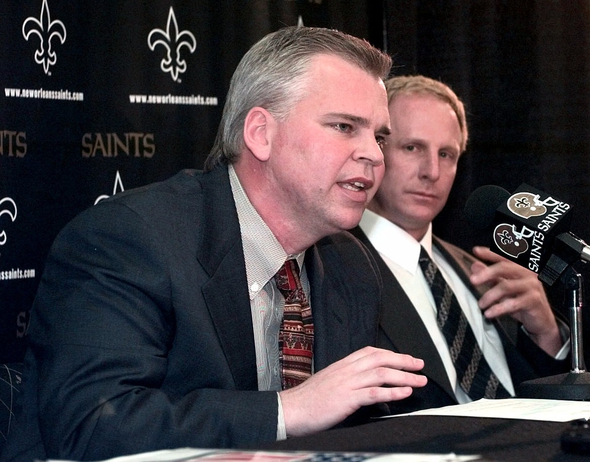 BILL HABER/Associated Press
New Orleans Saints general manager Randy Mueller answers a question as newly hired coach Jim Haslett, right, looks on at a news conference in New Orleans on Feb. 3, 2000. Haslett had just been named head coach, replacing fired coach Mike Ditka.