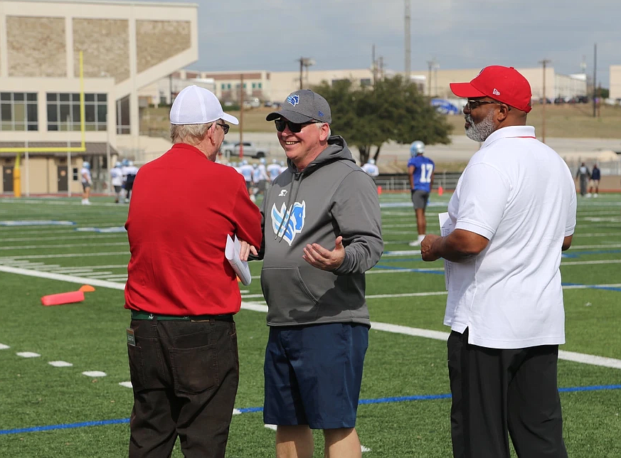 Courtesy photo
St. Maries native Randy Mueller was general manager of the Salt Lake Stallions of the Alliance of American Football in 2018-19, here talking to Pro Football Hall of Famer Bill Polian, left, who was head of football for the AAF, as former NFL executive Tony Softli, right, listens.