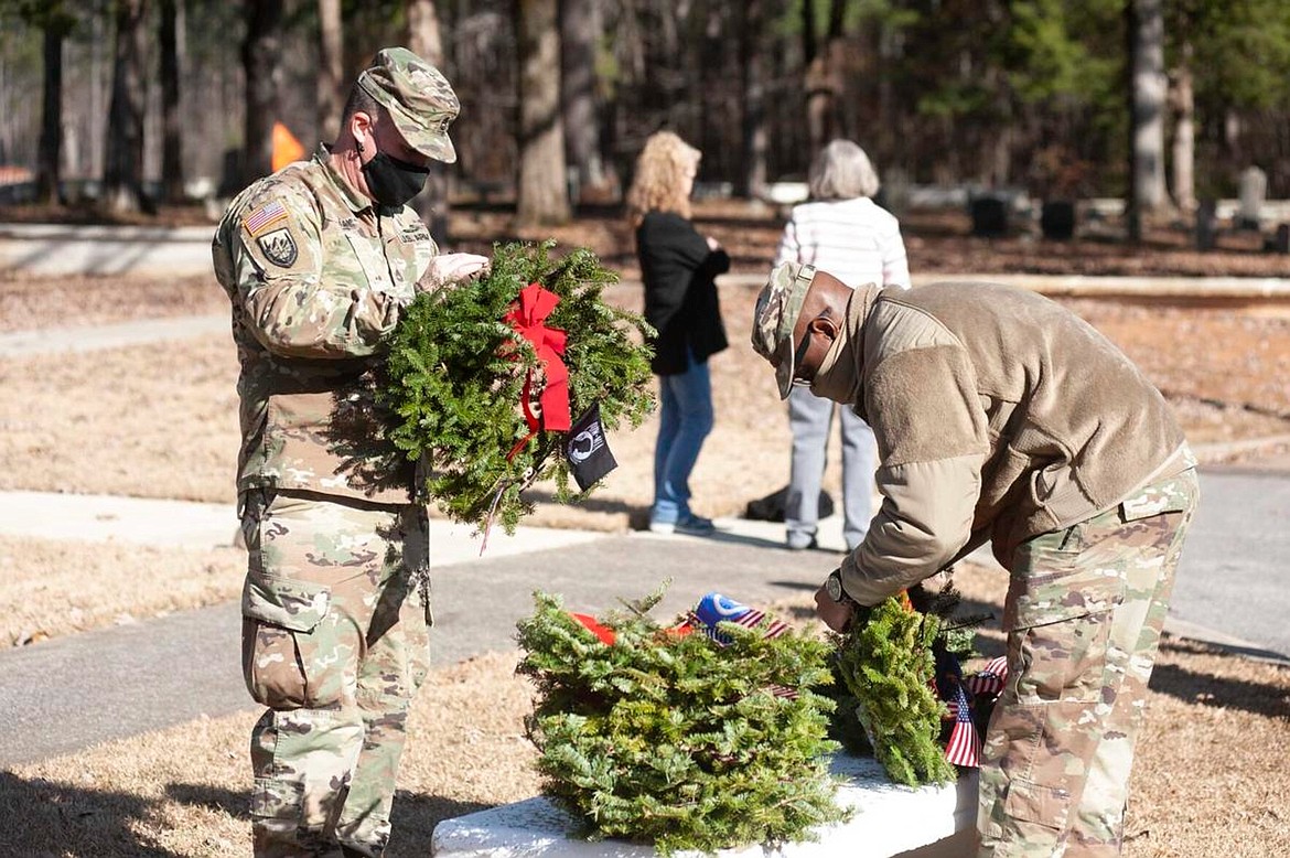 U.S. service members assist in one of Wreaths Across America’s annual wreath-laying ceremonies.