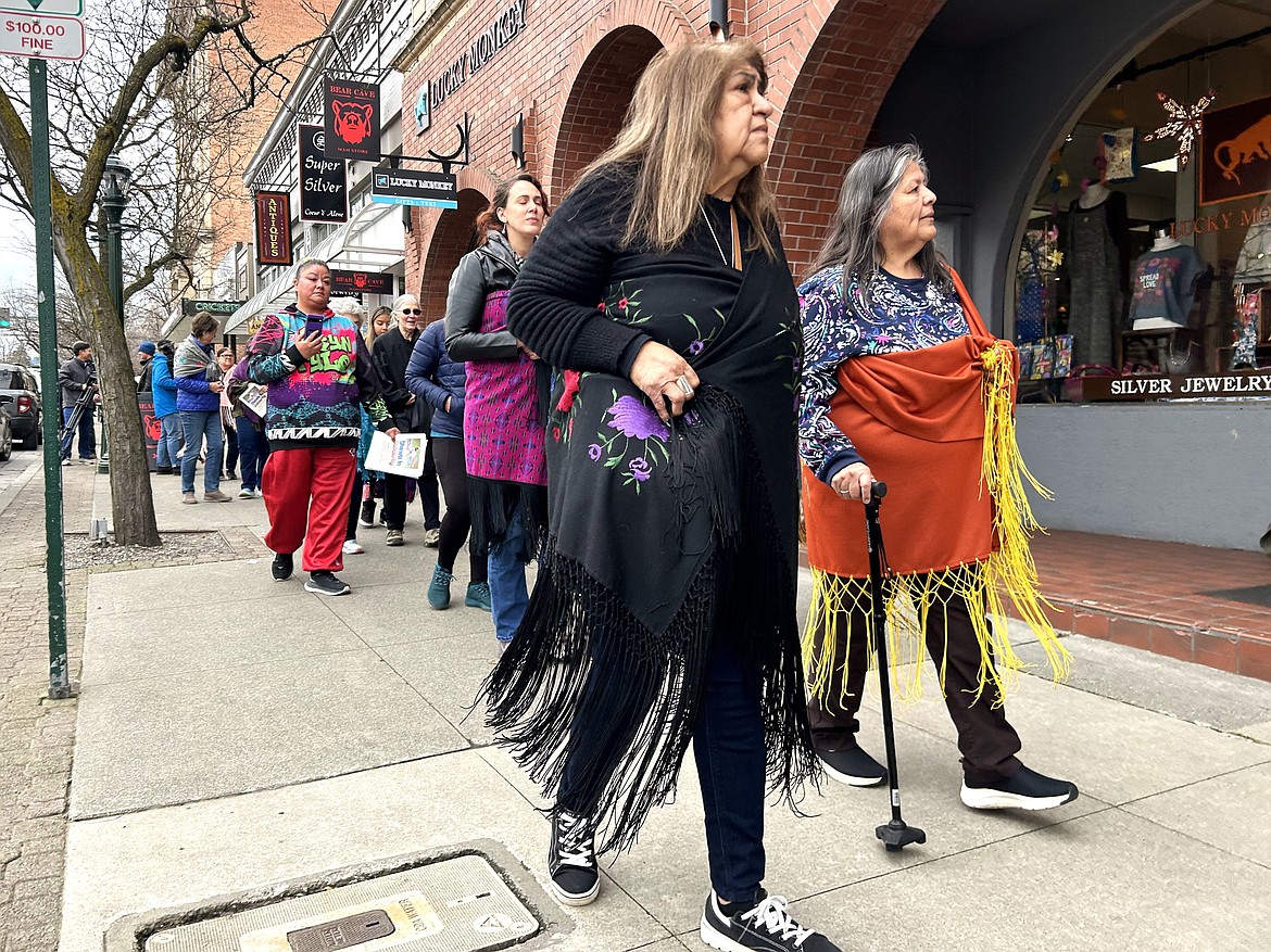 Rachel Paisano-Edwards, left, and Liz Arthur-Attao of the Nez Perce Tribe take part in the "Shawls in Solidarity" walk on Sherman Avenue on Thursday.