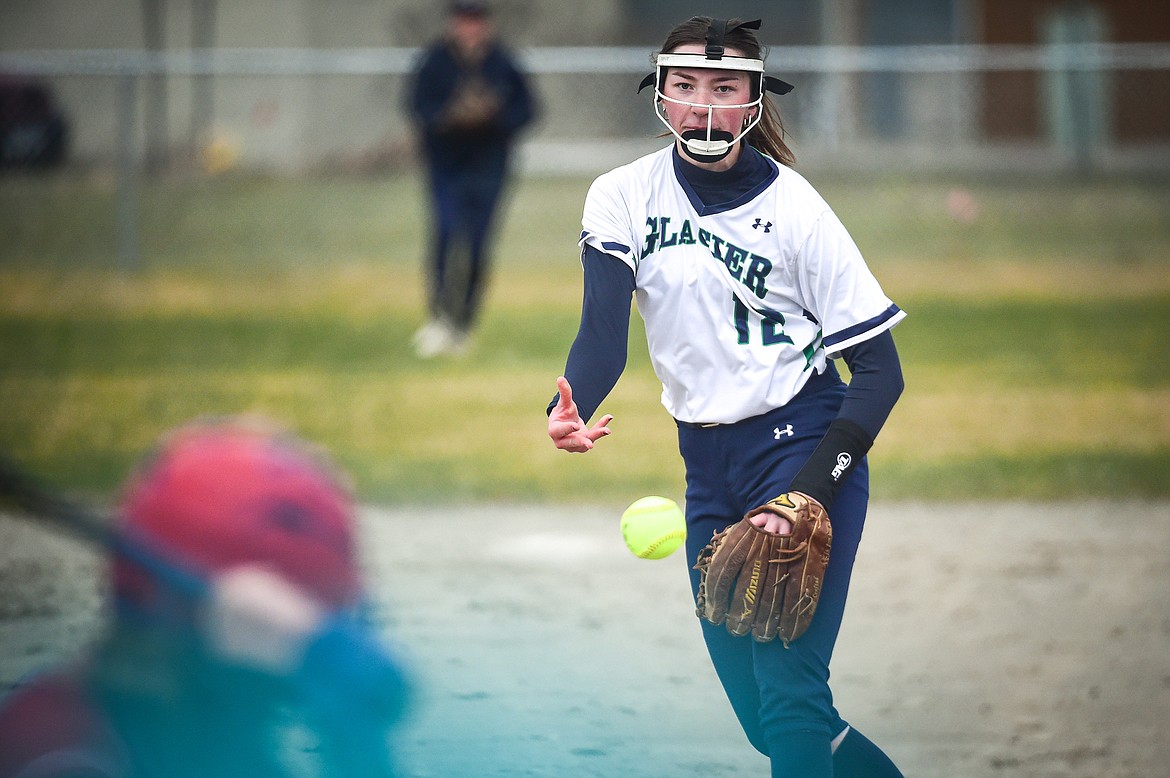 Glacier pitcher Ella Farrell (12) delivers in the third inning against Columbia Falls at Columbia Falls High School on Friday, April 5. (Casey Kreider/Daily Inter Lake)