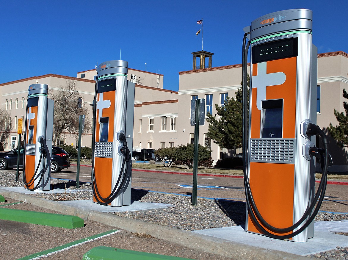 FILE - This Dec. 21, 2020 image provided by the New Mexico General Services Department shows some of the recently installed electric vehicle charging stations at the Bataan Memorial Building in Santa Fe, N.M. Mandates for auto dealers to provide an increasing number of electric vehicles for sale across New Mexico will remain in place as state regulators on Friday, April 5, 2024, denied an effort to derail implementation of the new rules pending a legal challenge. (Thom Cole/New Mexico General Services Department, via AP)