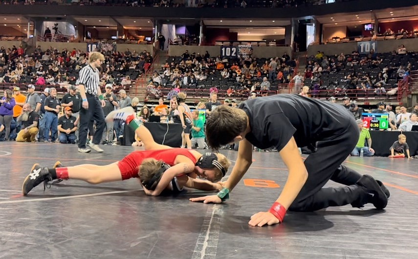 Elijah McLeish pins an opponent on Saturday.