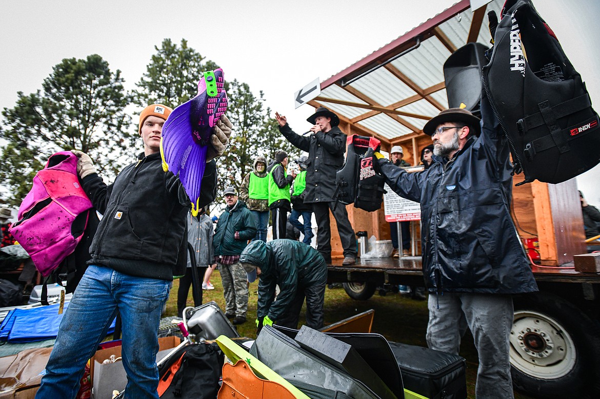 An auctioneer takes bids on items at the 58th annual Creston Auction and Country Fair on Saturday, April 6. The event is the largest fundraiser for the Creston Fire Department and has been held since 1966. (Casey Kreider/Daily Inter Lake)