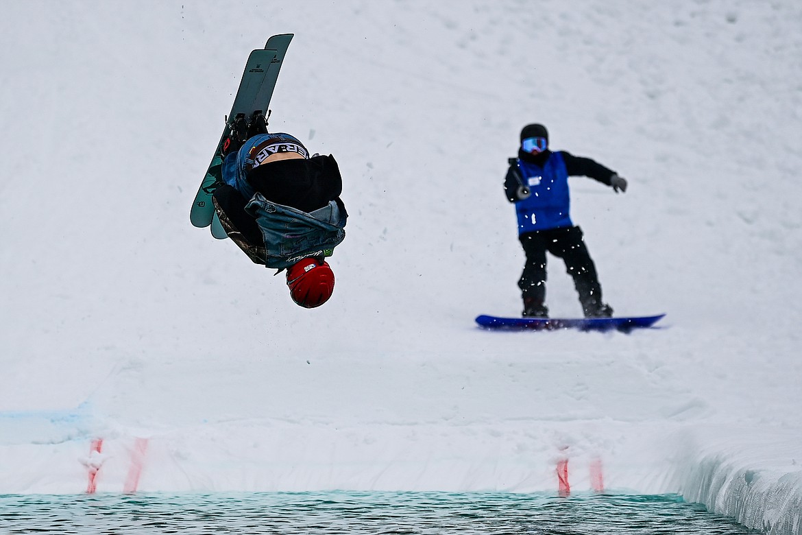 A participant crashes attempting a backflip during the pond skim at Whitefish Mountain Resort on Saturday, April 6. (Casey Kreider/Daily Inter Lake)