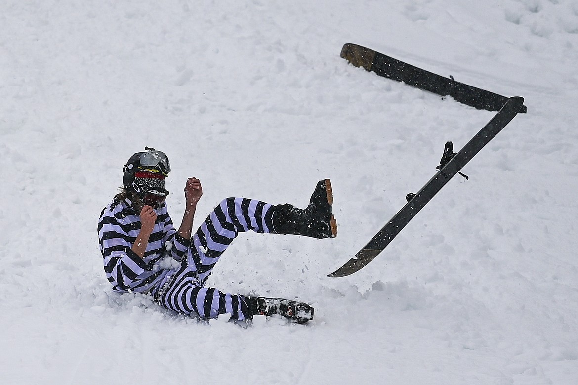 A participant crashes before reaching the pool at the pond skim at Whitefish Mountain Resort on Saturday, April 6. (Casey Kreider/Daily Inter Lake)