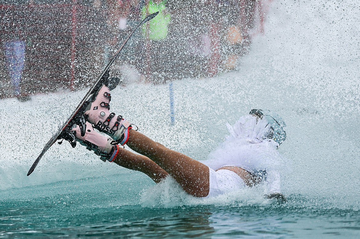 A participant crashes during the pond skim at Whitefish Mountain Resort on Saturday, April 6. (Casey Kreider/Daily Inter Lake)