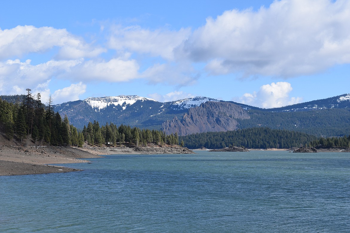 Sun shines down on Rimrock Lake on the south side of Highway 12 in the Cascades the afternoon of March 30. While temperatures are still chilly in the area, people were already getting out and fishing on the lake. Fishing licenses expired at the end of March, so outdoors enthusiasts may want to ensure they’ve gotten new licenses.