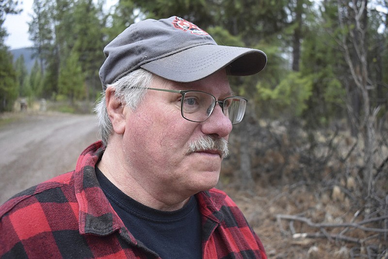 Paul Resch is seen on Thursday, April 4, 2024, near Libby, Montana. The 61-year-old has asbestos-related disease and is among thousands of people who were exposed to asbestos after contaminated vermiculite was mined near Libby and shipped through the small town by rail. (AP Photo/Matthew Brown)