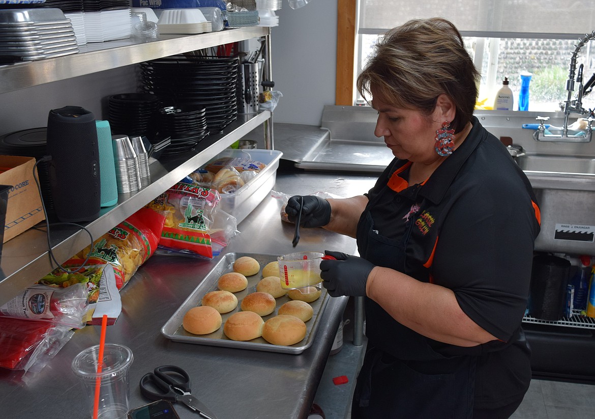 Classic Grill’n co-owner Birdie Fought prepares food inside the Classic Grill’n café’s commercial kitchen, which is attached to Othello’s Old Hotel Art Gallery and Museum and was completely renovated by Classic Grill’n.