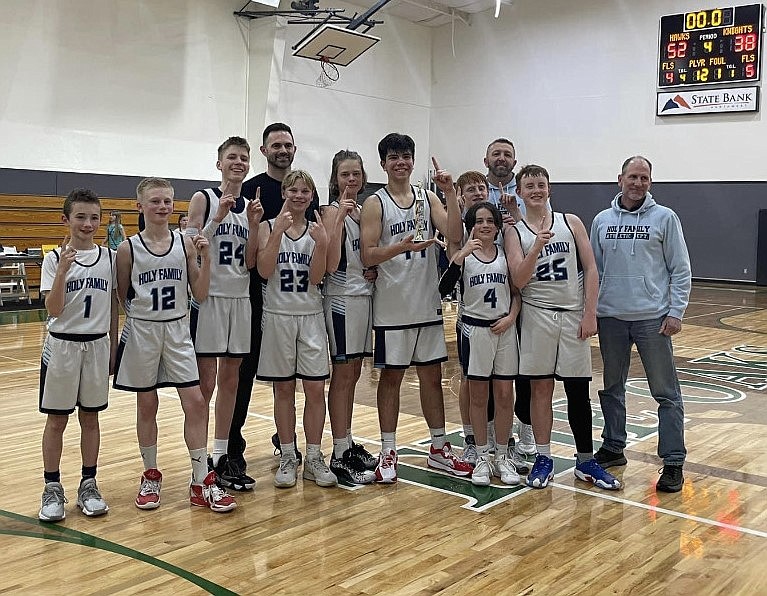 Courtesy photo
The Holy Family Catholic School middle school (grade 6-8) boys basketball team won the Mountain Christian League Tournament at The Oaks in Spokane Valley. From left are Eli Franz, Rhett Gama, Grant Clemens, coach Jordan Gama, Sam Murphy, Rogan Velin, Ty Ball, James Roscoe, coach Kellen Clemens, Drew Bragg, Jimmy Doree and coach Rett Roscoe.