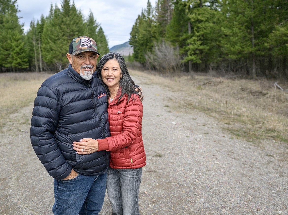 Mick and Wendy Ruis pose on the CFAC property last week. Most of the site is woods and meadows. (Chris Peterson photo)