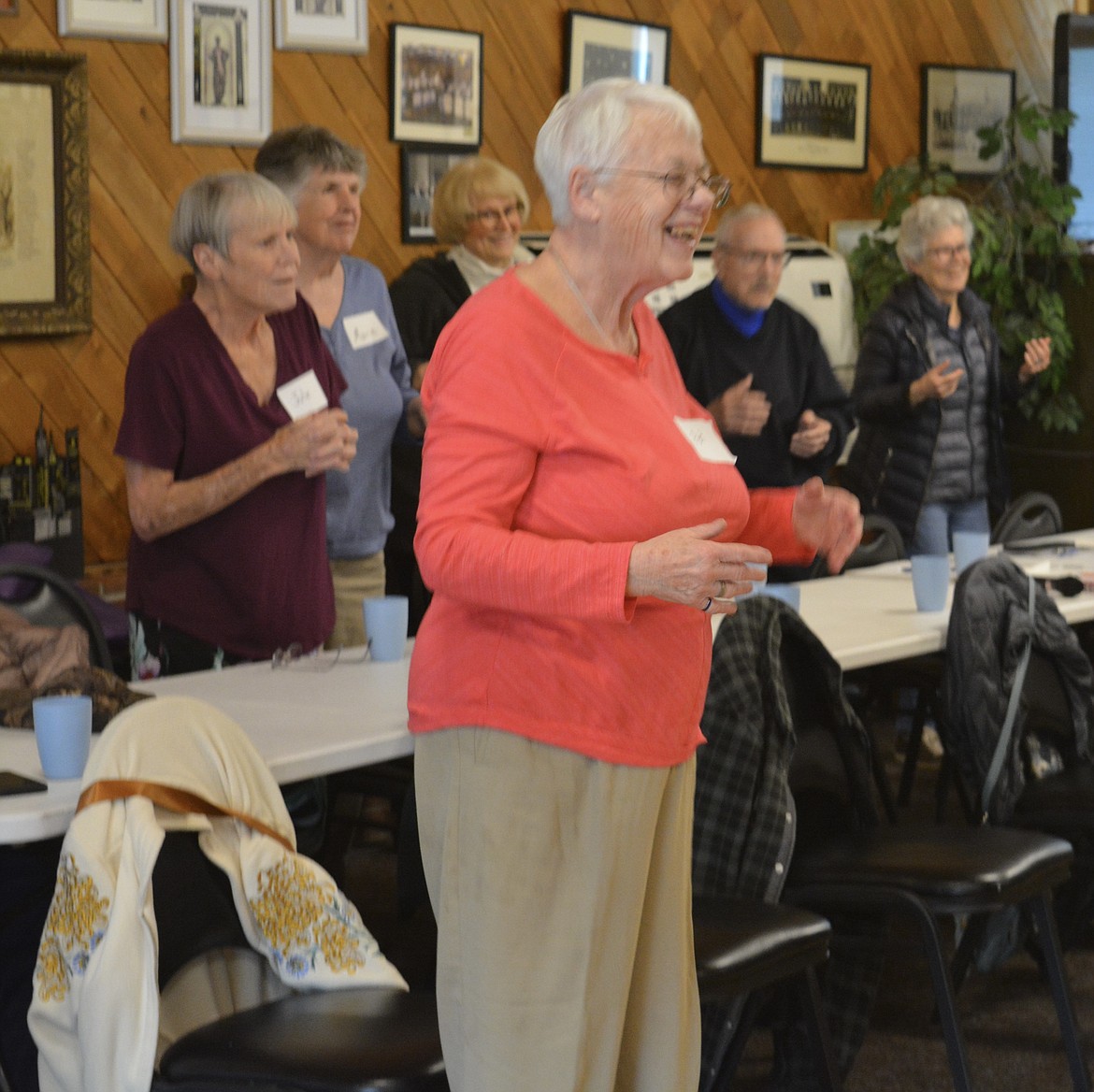 Pat Cook, of Coeur d'Alene, laughs during a yoga session at the Coeur d'Alene Elks Lodge.