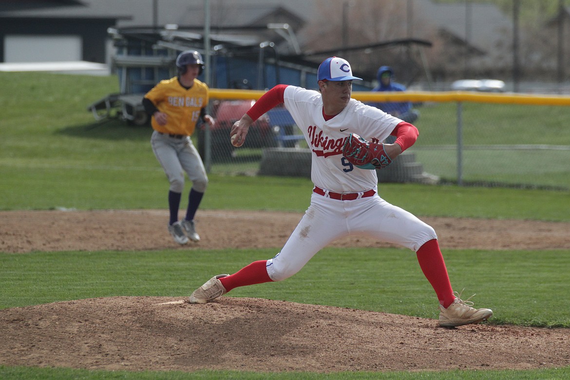 MARK NELKE/Press
Aidan Blanco of Coeur d'Alene delivers as Zack Bambacigno (15) of Lewiston takes his lead Tuesday in the first game at Coeur d'Alene High.