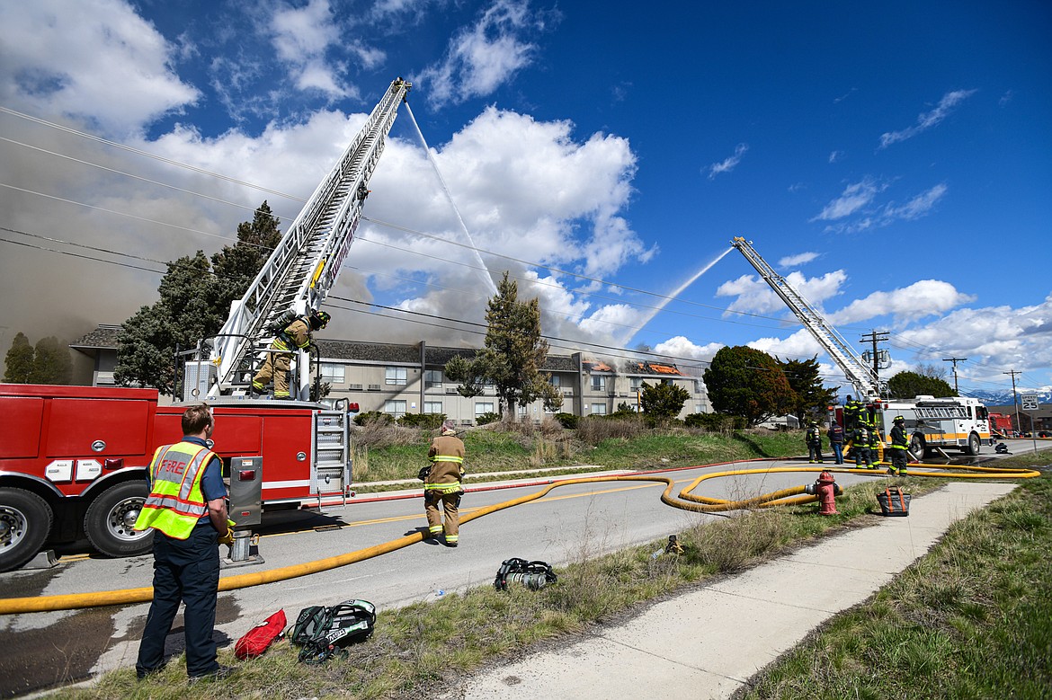 Firefighters battle a blaze at the Quality Inn on U.S. Highway 2 West in Kalispell on Wednesday, April 10. (Casey Kreider/Daily Inter Lake)