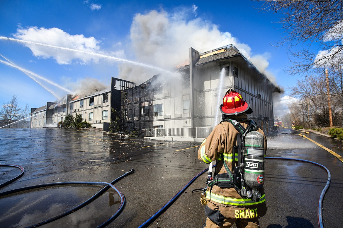 Kalispell Fire Department firefighters battle a fire at the Quality Inn on U.S. Highway 2 West in Kalispell on Wednesday, April 10. (Casey Kreider/Daily Inter Lake)