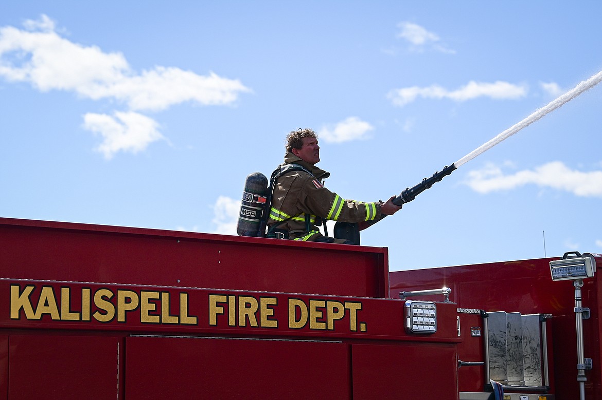 Kalispell Fire Department firefighters battle a fire at the Quality Inn on U.S. Highway 2 West in Kalispell on Wednesday, April 10. (Casey Kreider/Daily Inter Lake)