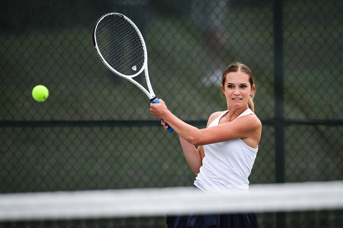 GLACIER'S HAVEN SPEER hits a backhand return during a doubles match at last year's State AA Tournament in Kalispell. (Casey Kreider/Daily Inter Lake)