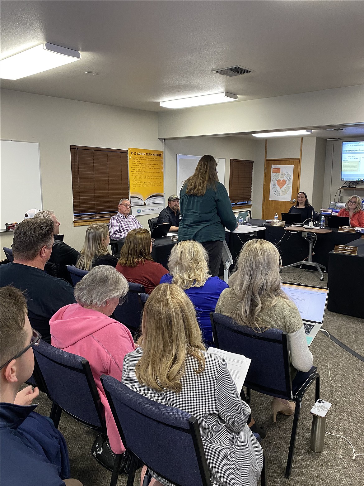 Sixth grade teacher Susan Chatterton makes a comment during a Lakeland Joint School District meeting Wednesday night. Books in the supplemental curriculum have been a source of controversy within the district.