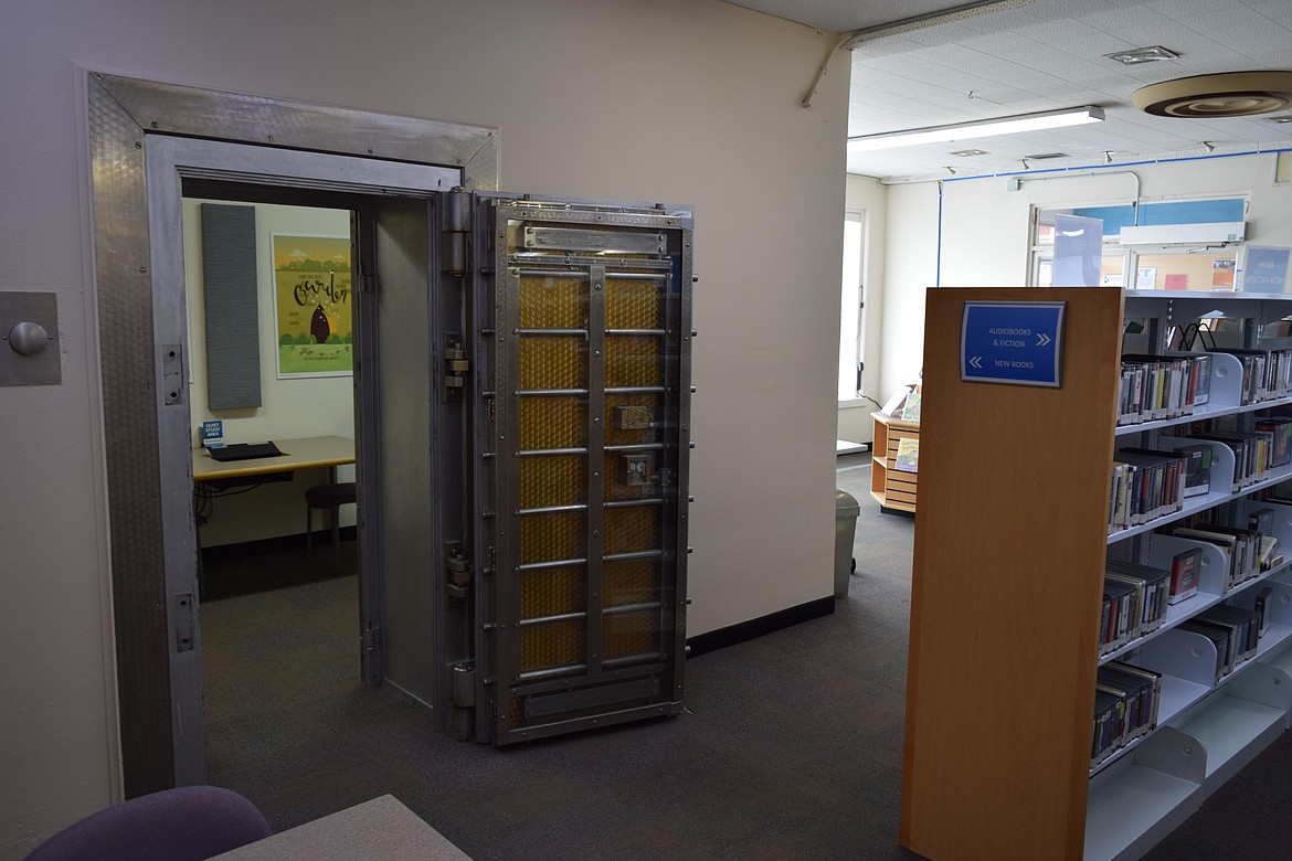 The Othello Public Library opened its doors to the public in 1995 after moving into a former bank building, as evidenced by the old vault door now leading into the pictured study room near the front of the library.
