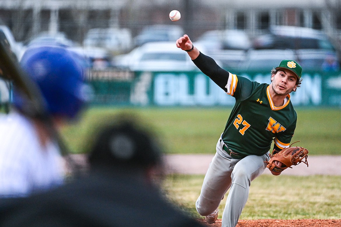 Whitefish pitcher Michael Miller (27) delivers against Columbia Falls at Sapa-Johnsrud Field on Thursday, April 11. (Casey Kreider/Daily Inter Lake)