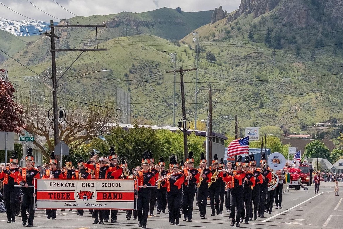 The Ephrata High School band marches through the 2023 Apple Blossom Festival grand parade.