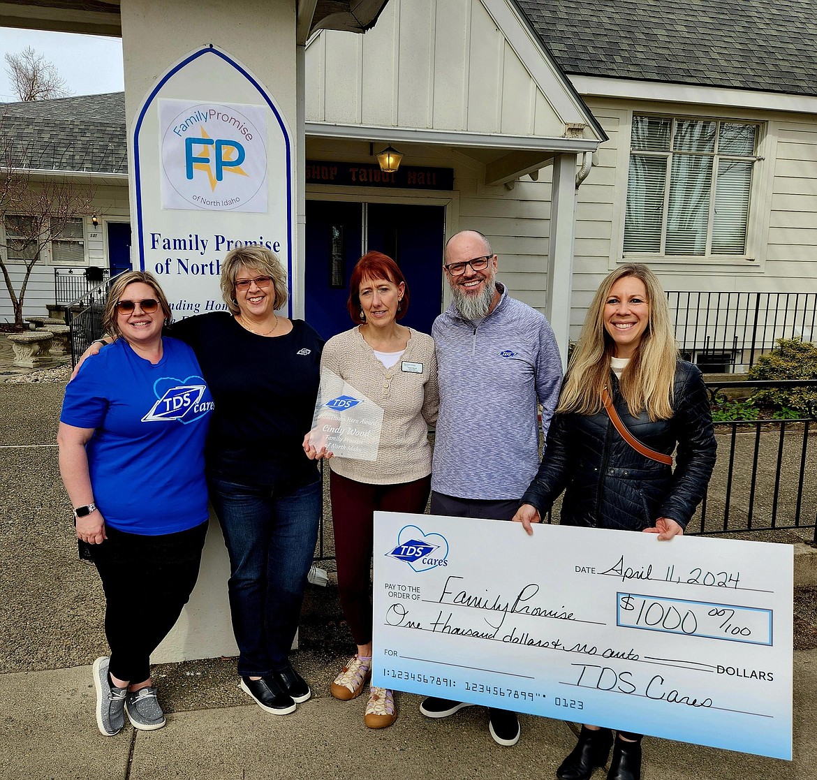 TDS presents a Hometown Hero Award to Cindy Wood of Family Promise on Thursday. 
From left, Sandy Raudebaugh, TDS associate manager of field marketing; Kari Gary, TDS director of marketing; Cindy Wood; Scott Schultz, vice president of marketing and product development; and Toni Frazier, TDS senior manager of marketing.