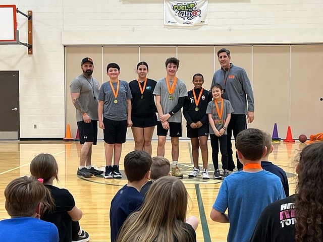 The Old Group 5-on-5 champions of the Basketball School of Sandpoint Spring Break Camp. From left, coach RJ Laiche, Ethan Garza, Mattie Jones, Brennen Wyman, Brooklyn Windju, KC Wilson, and coach Darren Laiche. Jones scored eight out her teams' 16 points in the championship game.