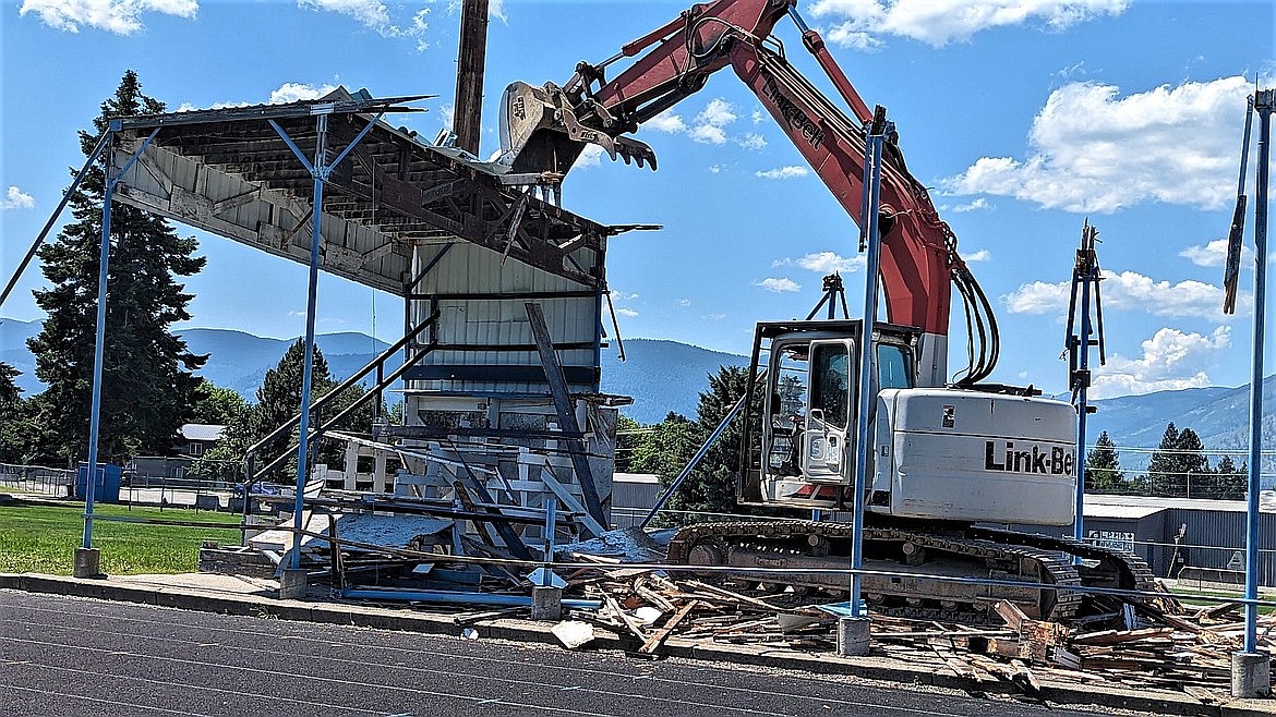 Crews demolish the old stadium at Bonners Ferry High School's Mendenhall Stadium.