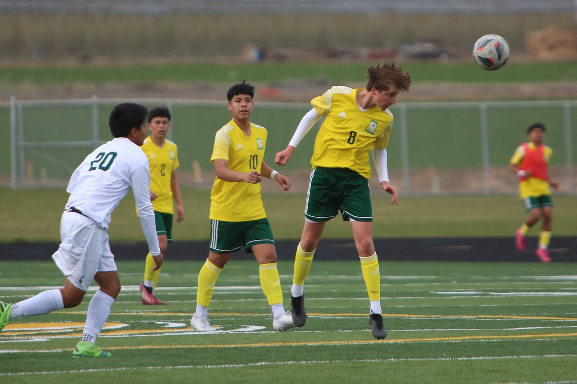 Quincy junior Danny Mendoza (15) sets up a shot in overtime against Chelan on Thursday. Mendoza scored the eventual game-winning goal against the Mountain Goats.