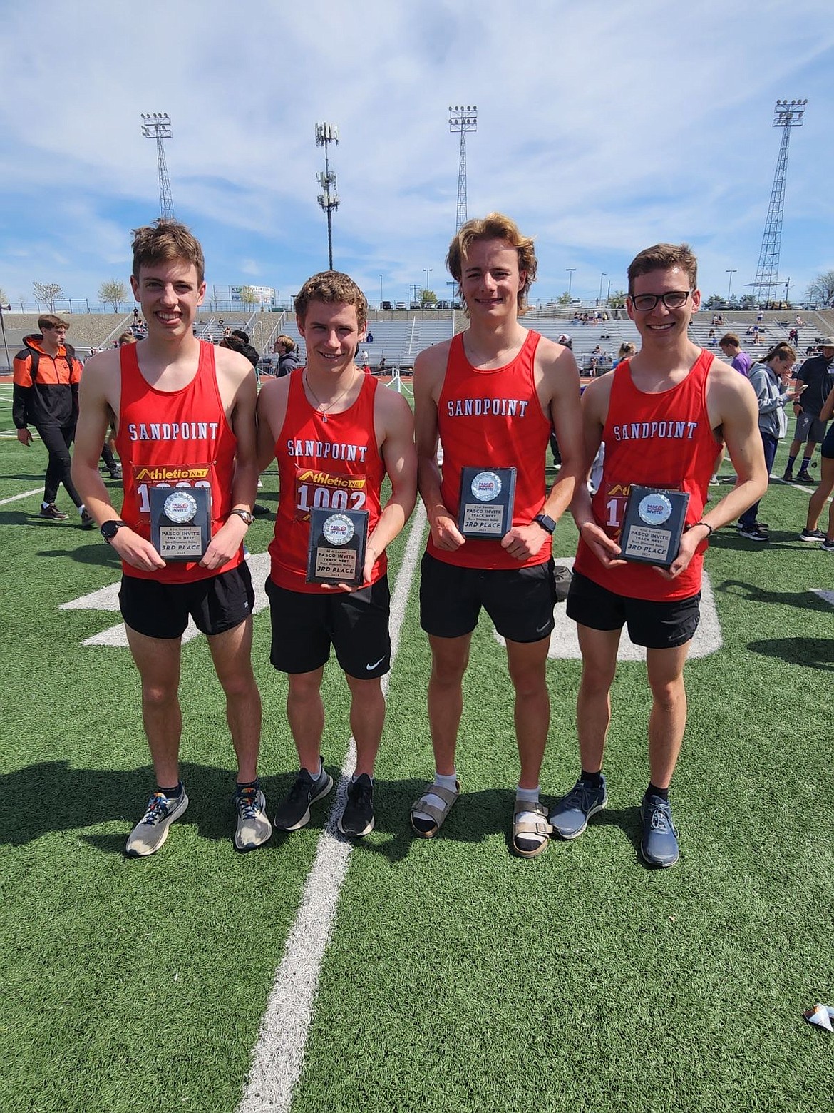 Courtesy photo
From left: Sandpoint's Daniel Ricks, Jett Longanecker, Kasten Grimm, and Nathan Roche pose with the plaques they received for finishing third in the boys' distance medley relay at the Pasco Invitational on Saturday.