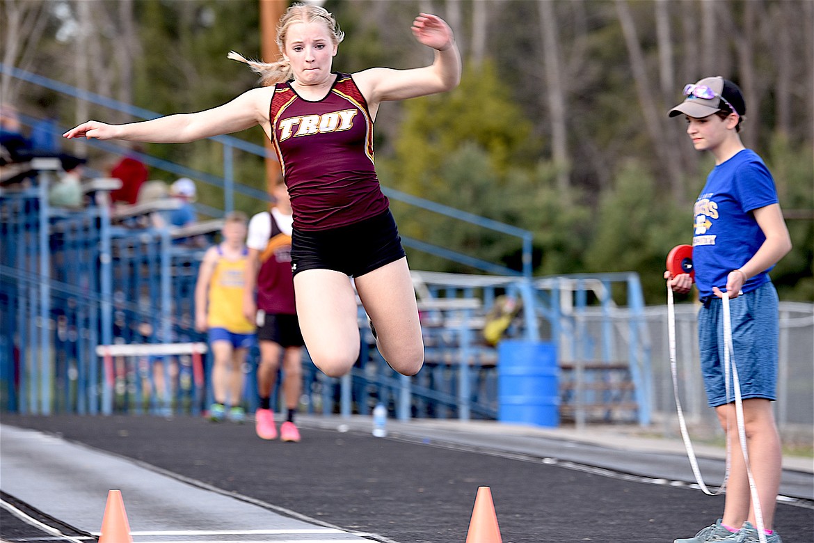 Troy's Cortenie Rogers triple jumps on Saturday, April 13, 2024 at the Libby Track and Field Invitational. (Scott Shindledecker/The Western News)