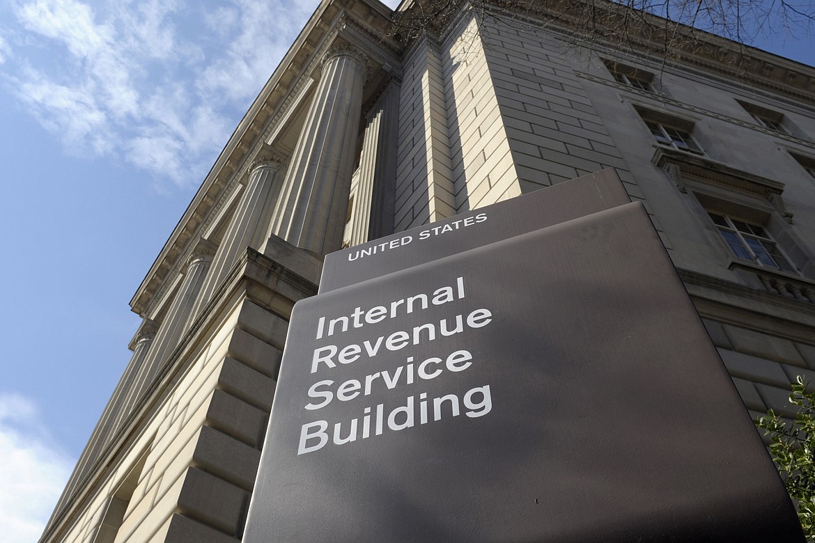 The exterior of the Internal Revenue Service (IRS) building is seen in Washington, on March 22, 2013. The IRS is promoting the improvements its made to its customer service since its received tens of billions in new funds through Democrats' Inflation Reduction Act. Agency leadership is trying to bring attention to what's been done to repair the agency's image as an outdated and maligned tax collector. Monday, April 15, 2024, is the last day to submit tax returns or to file an extension. (AP Photo/Susan Walsh, File)