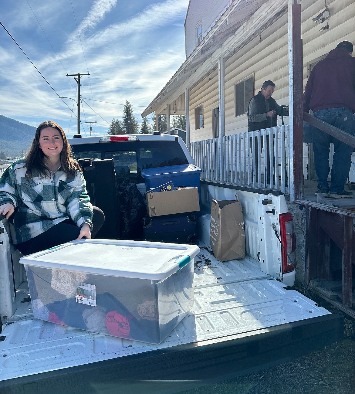 Lauren Widman, from Florida delivered a truckload of warm-weather clothing, and jackets to the Women in Timber Thrift Store in Superior during her spring break. (Photo courtesy/Lauren Widman)