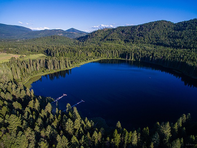 Round Lake State Park and Round Lake in Bonner County are seen from above. North Idaho is home to several stunning state parks that offer everything from swimming and boating to nature hikes and information about local history.