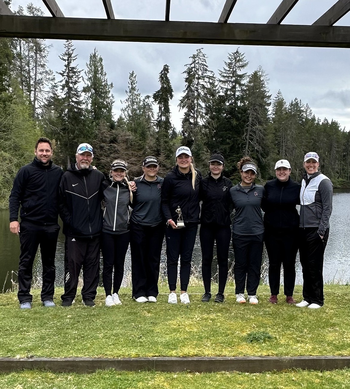 Courtesy photo
The North Idaho College women's golf team won the Olympic Invitational on Monday at Port Orchard, Wash. From left are head coach Russell Grove, volunteer coach Russ Grove, Rien Solodan, Megan Quinton, Ava Young, Lauryn Bulger, Laila Jalil,  Sofia Lippiello and assistant coach Brittany Pounds.