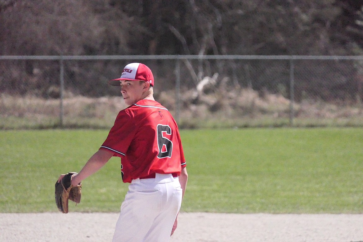 Noxon-Thompson Falls pitcher Michael Koskela winds and first toward home plate and a waiting Polson batter during their game this past week at the field in Noxon. (Chuck Bandel/VP-MI)