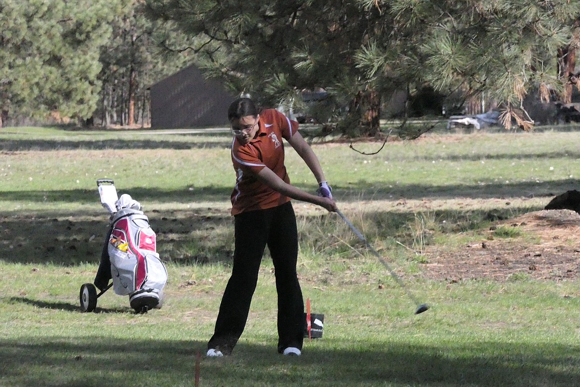 Plains golfer Cheyenne Little Whirlwind tees off at the second hole in Friday's Plains Invitational Golf tournament at WildHorse Golf Course in Plains.  (Chuck Bandel/VP-MI)