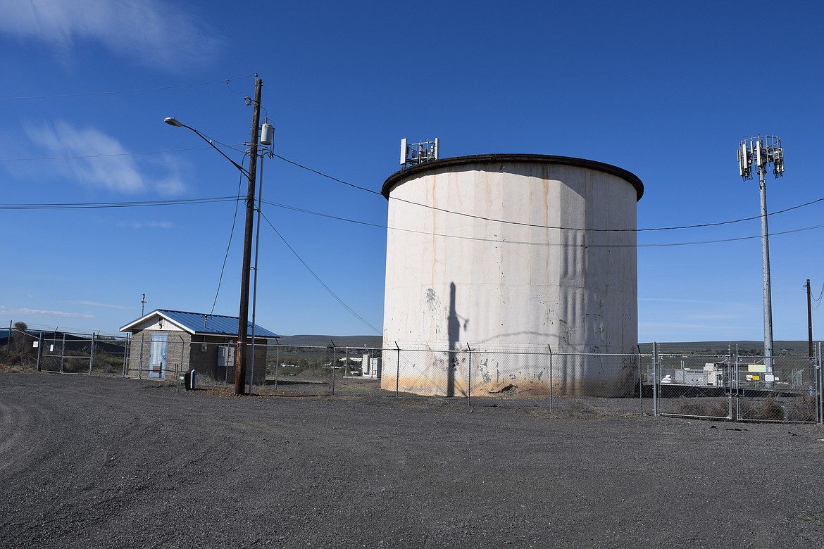 Water and sewer rates for Soap Lake businesses and residents will go up to help pay for short-term repairs and long-term upgrades. One of the city’s water towers and an associated facility building are shown above.