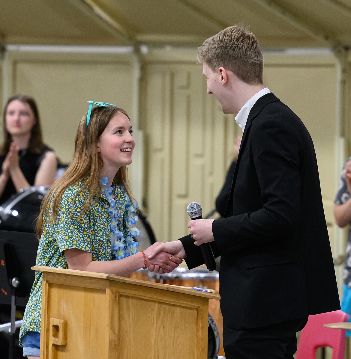 Plains music teacher Loren Lauridson presents the John Phillips Sousa Award to senior band member Peyton Wasson. (Tracy Scott/Valley Press)