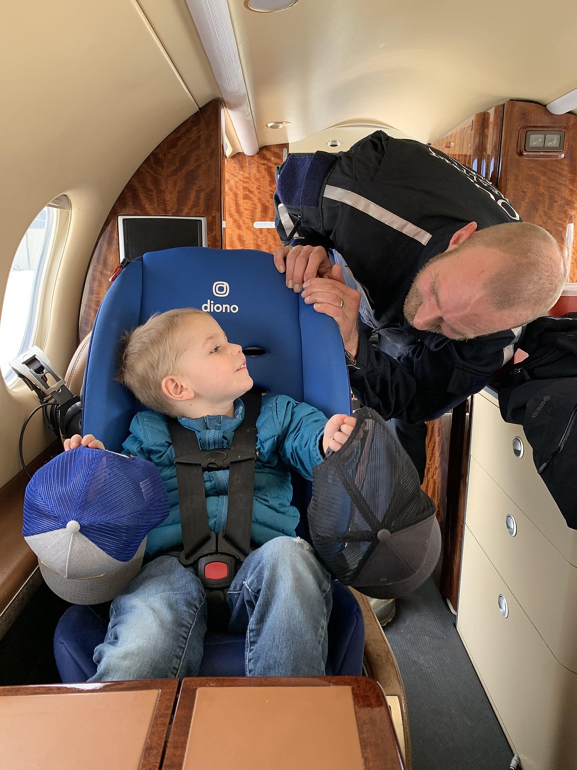 A.L.E.R.T. personnel with Kate and Lewis Johnson's son Ryder after their flight to Colorado. Lewis Johnson required specialty neurological care at Craig Hospital in Denver, Colorado after being ran over by a fleeing suspect in February of 2023. (photo provided)